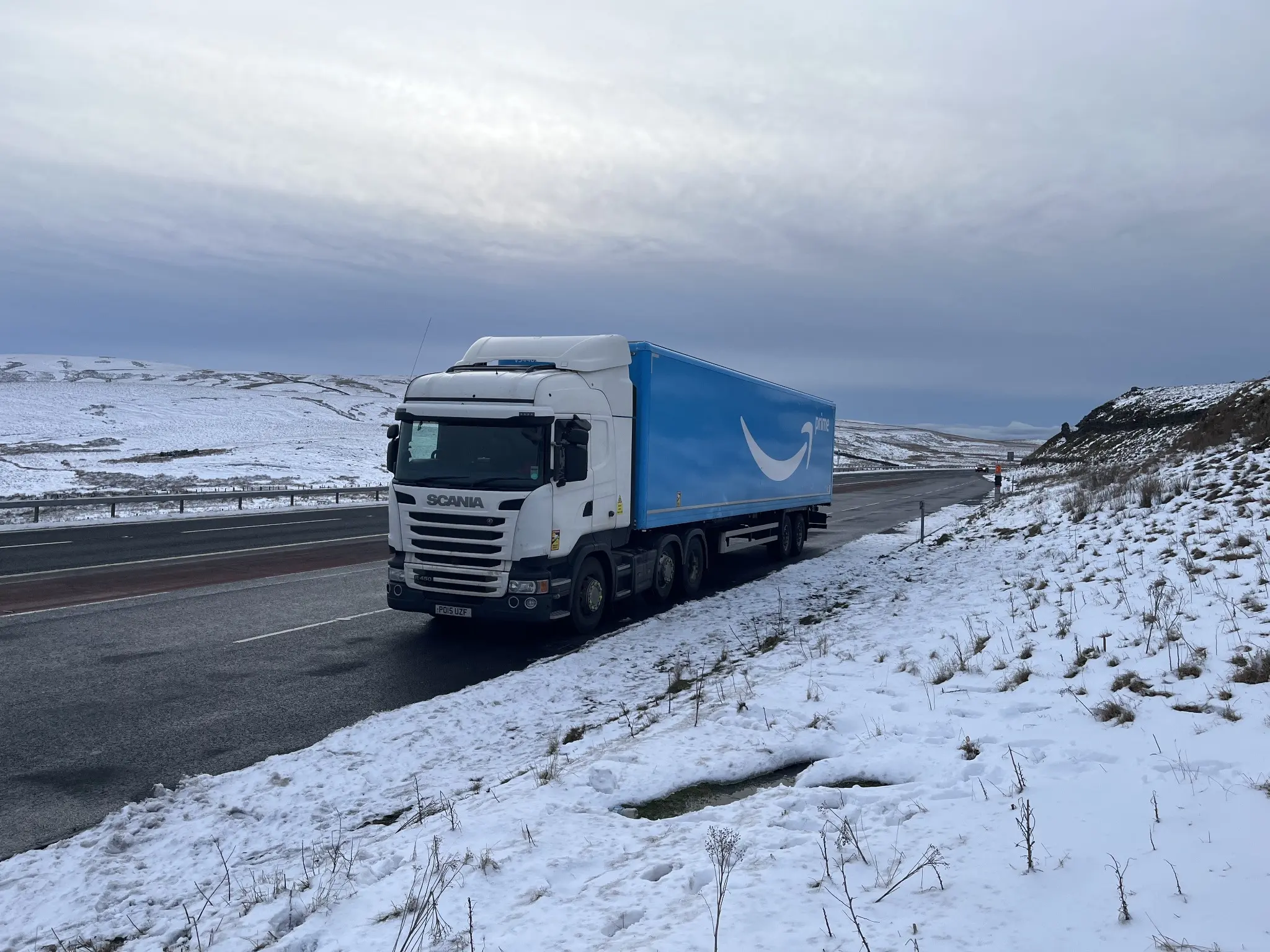 SergejTransport Scania tractor unit operating with a trailer on a winter UK route